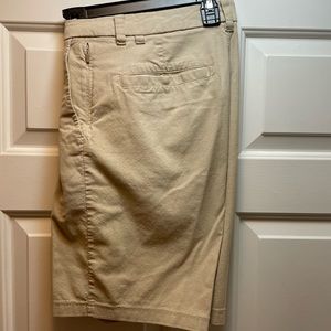 Dress style Lulu shorts, I believe they’re an 11” inseam but unsure. Tan colored